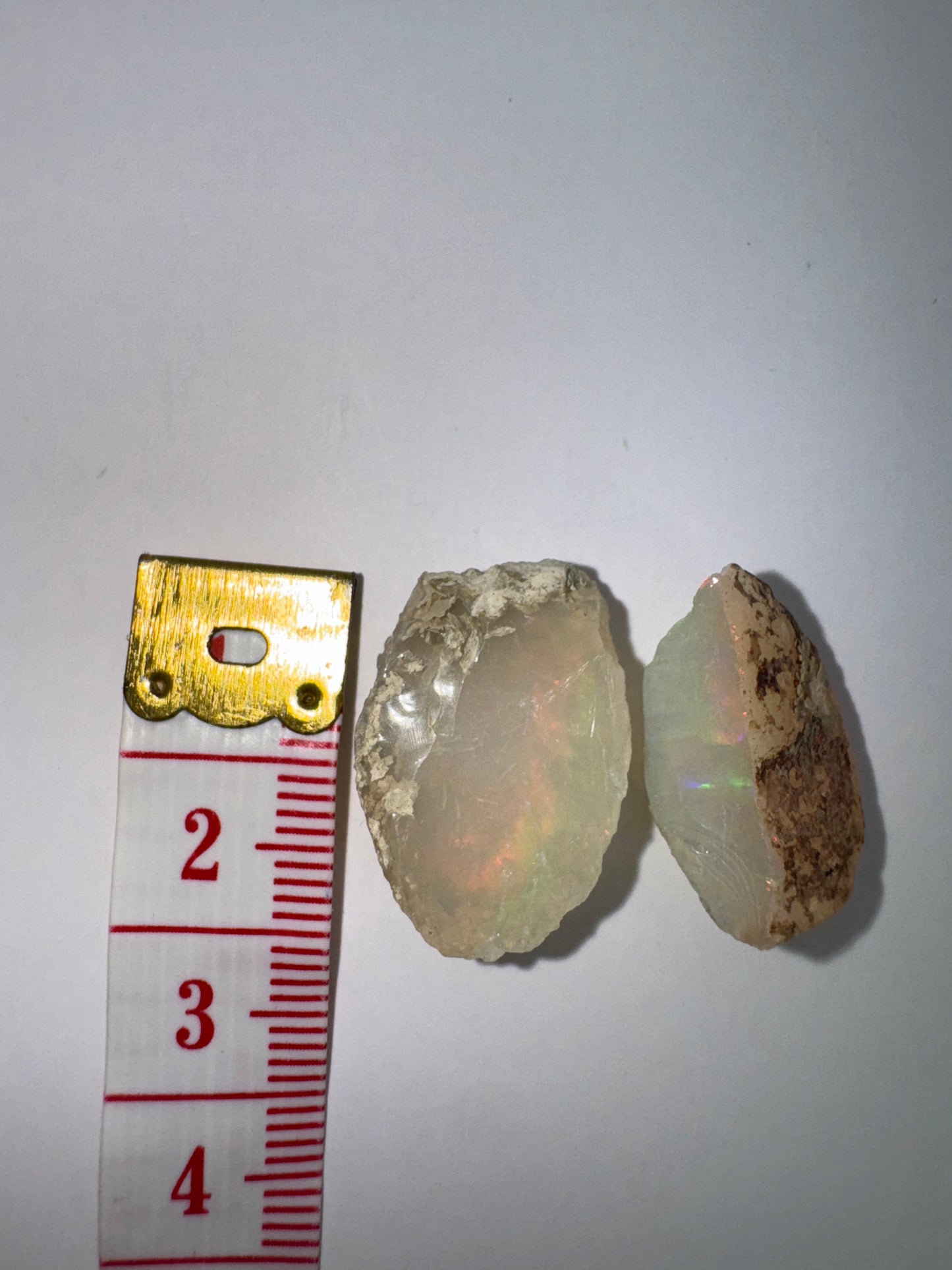 7 (2 opals; 18.55 ct total)