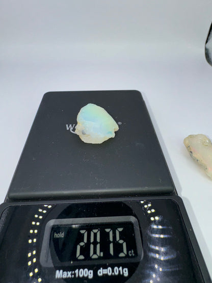 8 (2 opals, 36.75 cts total)