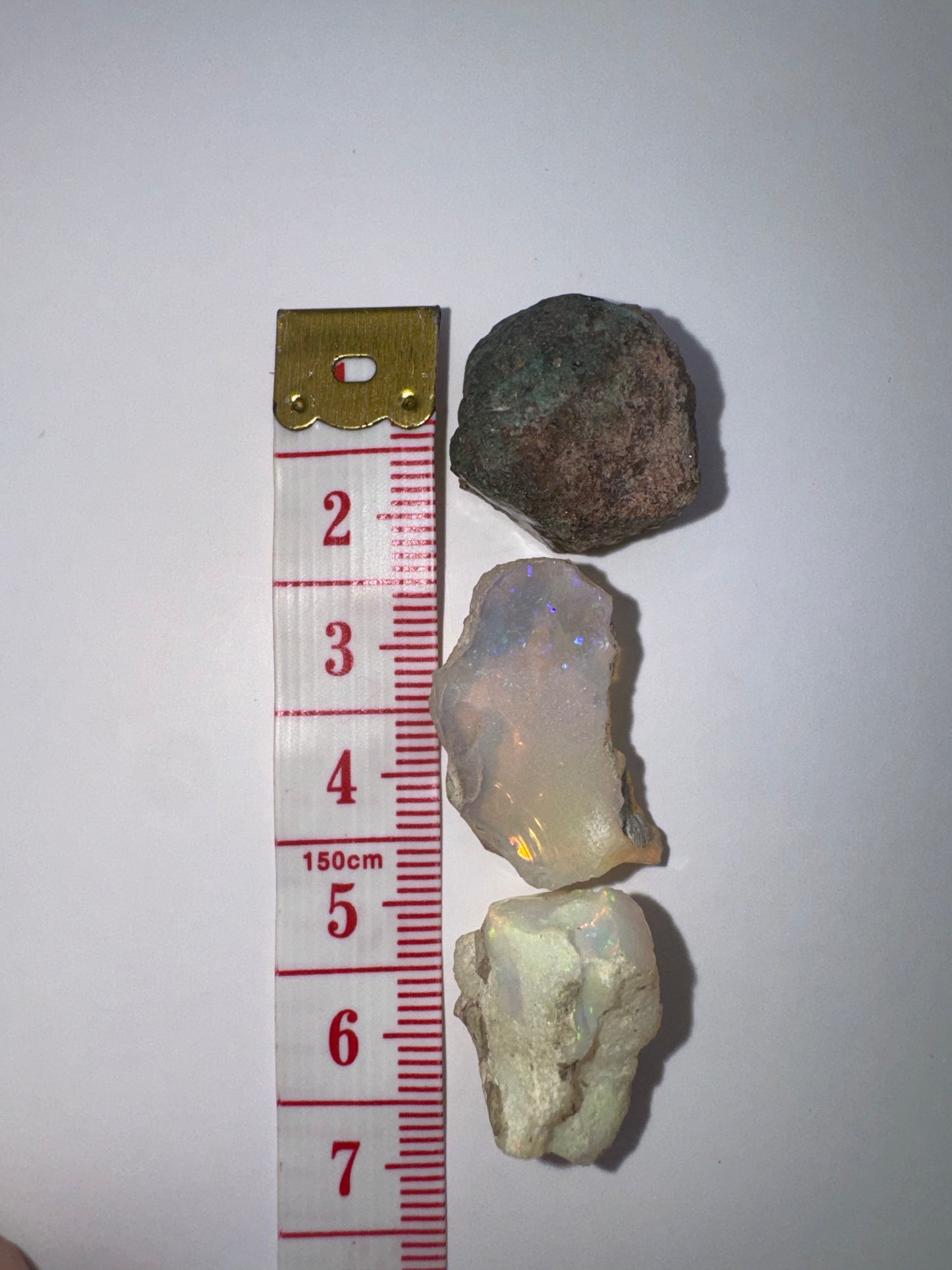 10 (3 opals: 47.40 cts)